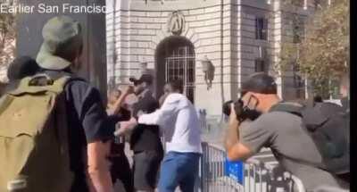 Protestors knock black mans front teeth out and call him racial slurs