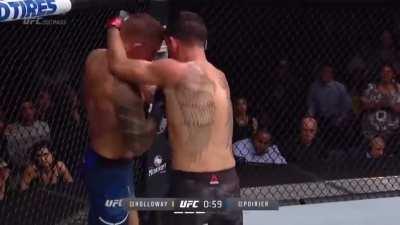 Max Holloway hurts Dustin Poirier with a ridiculous volume of strikes.