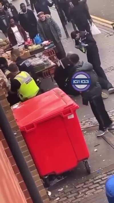 He threw a bike at the officers to stop his friend from getting arrested