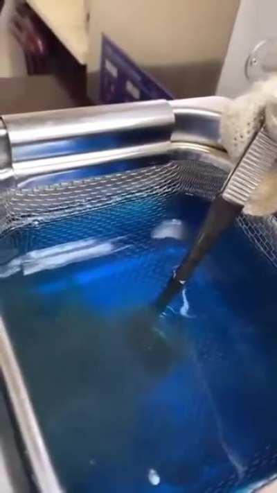 Cleansing Diamond Ring in Ultra Sonic Cleaner