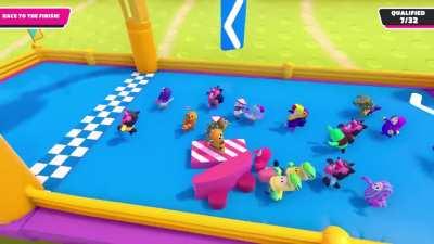 Peasants carry their king across the finish line in a chariot