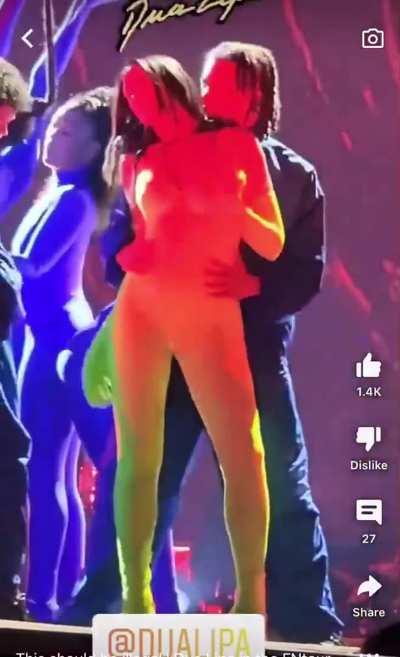 Dua Lipa allows herself to be groped.