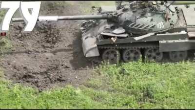 Russian T-62 VBIED that was disabled by mine is first attempted to be destroyed with drone dropped grenades before successfully being detonated with a FPV drone