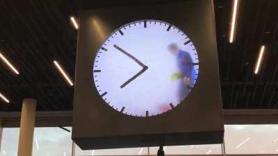 This human operated clock at Schiphol Airport