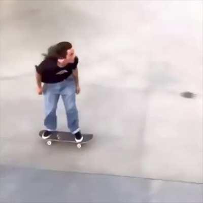 WCGW hopping a fence on a skateboard
