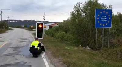Heavily guarded border checkpoint between Norway and Finland teared down by Finnish border guards after covid-19 restrictions reduced between the two countries