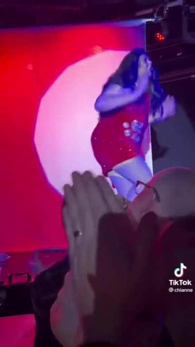 Does George Santos look better in a blue suit or in a red dress?