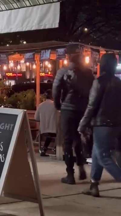 Couple seen engaged in sex acts at an outdoor dining area in New York