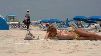 Teasing the dads at the public beach