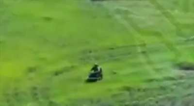 Russian soldier on motorcycle drives into a mine somewhere in eastern Ukraine