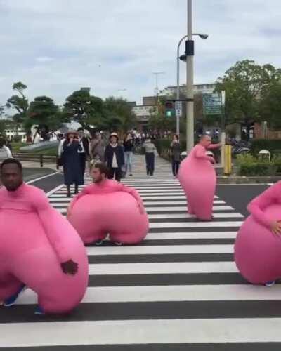 Bouncing pink men.
