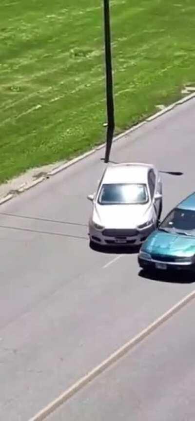 Throwing rocks at cars