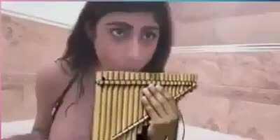 Song? Some sort of flute tune, sounds potentially of Asian decent.