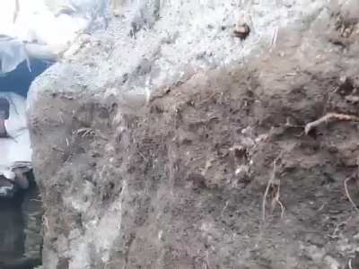 The full version of a Ukrainian soldier defending a trench from approaching Russian forces (2023).