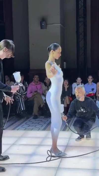 Dress created live on runway.