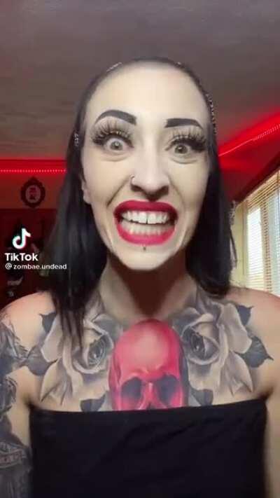 Why does she have a chest tattoo of Jordan Peterson?