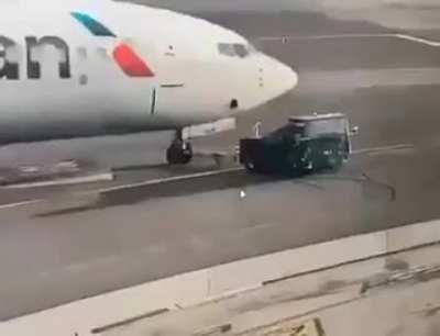 Tow Truck Driver gets Cabin Rammed By Airplane. Driver Unharmed.