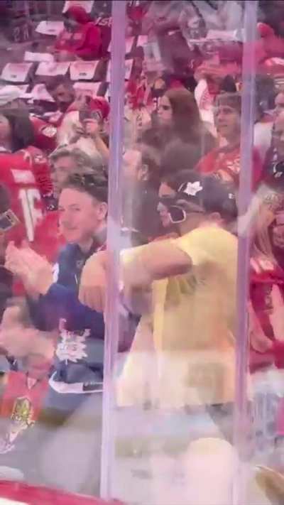 Leafs fan behind the Panthers net was getting undressed and  dancing was then escorted out