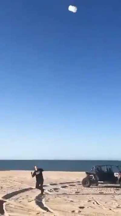 Just some guys having fireworks fun at the beach...