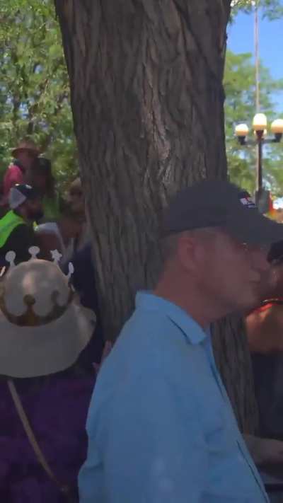 MAGA agitator attempts to draw pistol on peaceful No Kings protestors, is then tackled by those around her. (Fuck)