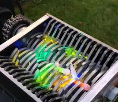 Extremely satisfying : Dropping glow sticks into the shredder