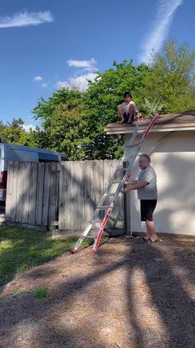 My bro climbed up on the roof and got caught