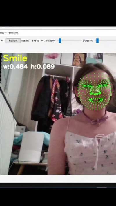 Coded a software that shocks you if you stop smiling