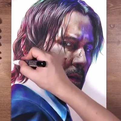 Drawing John Wick using colored pencils (@drawholic.page on IG)