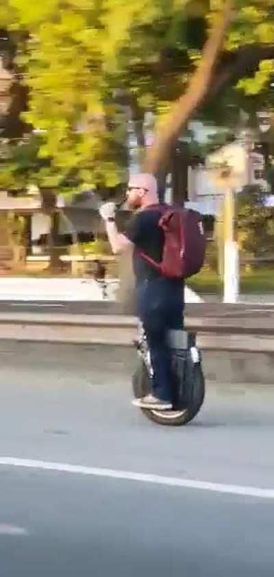 WCGW riding a wheel in high speed while drinking beer, dancing and looking to the sides