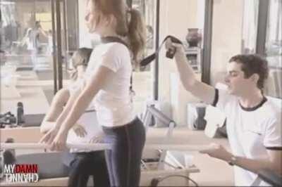 Isla Fisher leashed and ready to go