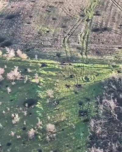 Direct mortar strike on russian soldiers hiding in shell crater