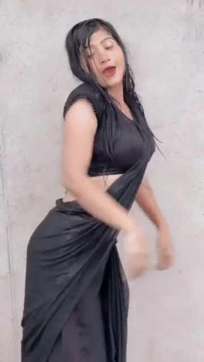 Wet saree, pokies, navel and tight booty
