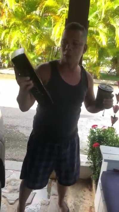 Guy drops his new bottle of johnnie walker black label on the floor