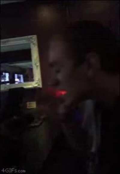 Man puts cocktail fireworks (sparkler) in his mouth