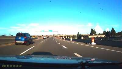 Lifted truck recklessly cuts me off, blocks my vision of a multi car accident ahead (guy stopped on the bridge because his hood came loose), and drives off. No one was badly hurt and I lived to tell the tale...(my audio is reversed too for some reason..)