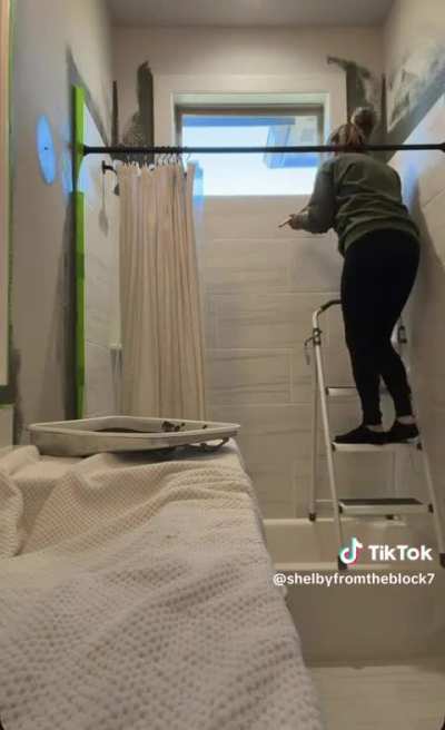 Putting a ladder on top of a bathtub