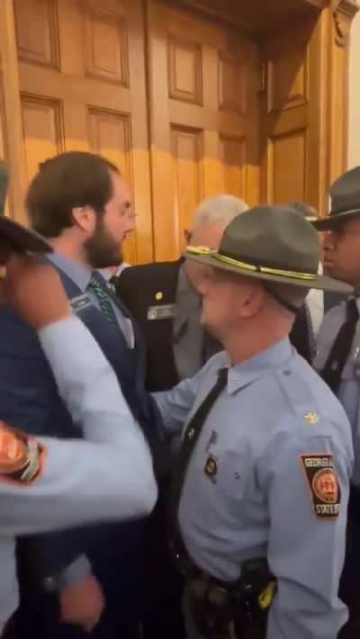 Georgia state senator arrested at the Capitol while attempting to enter the House chamber from which he was previously barred.