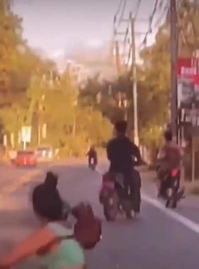 Trying to kick another rider.