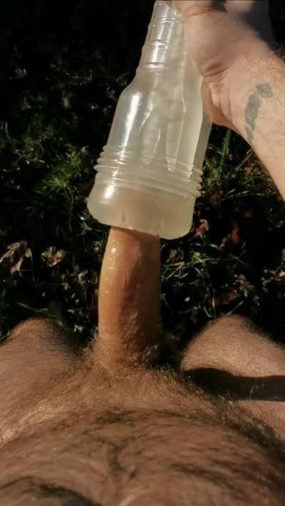Nude toy jacking outdoors