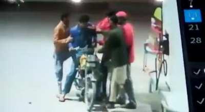 Lighting a cigarette at a Petrol Station