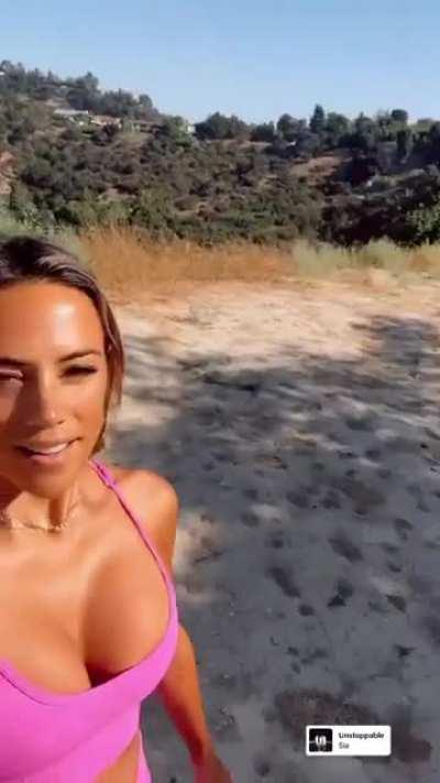 Walking wearing pink.