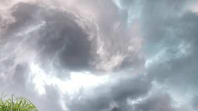 A rare view of a tornado forming while being underneath it!