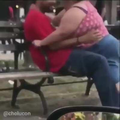 classic mondays: black guy doing a horny dolphin in public garden,nothing to see here.