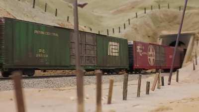 Finally got my rapido kodachrome and have been running it hard. Here it is leading a westbound TOFC train into Tunnel 5 on the Tehachapi Pass.
