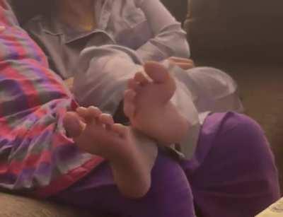 Friend's cross soles on lap