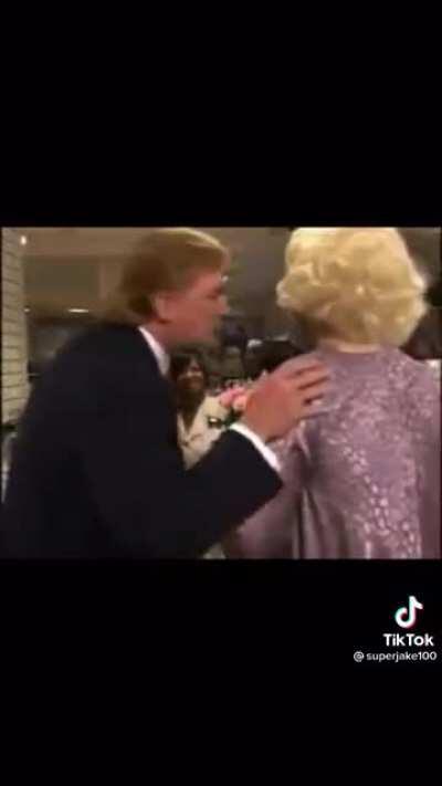 RUDY GIULANI IN DRAG, BEING MOTORBOATED BY DONALD TRUMP. & ITS REAL
