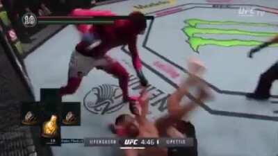 Dark Spirit Anthony Pettis clips Host Tony Ferguson, forcing him to roll to safety