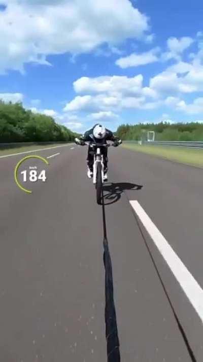 Bicycle towed behind superbike reaches 169 mph (273 kmh)