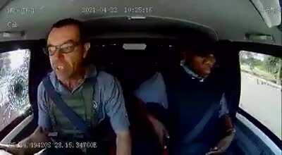 Different type of combat. Attempted cash van heist in South Africa. Three suspects were arrested. Action starts from 1'05min in.