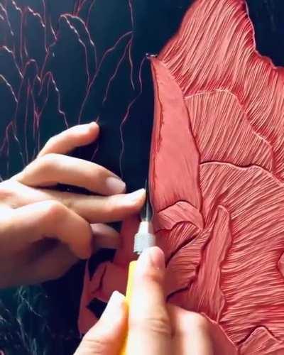 Hannah Jensen Contemporary Artist's work combines painting with carving.